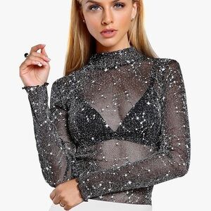 Sheer long sleeve black and silver top with white star designs